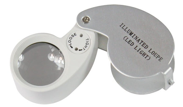 Folding magnifying glass with LED lighting and 10x magnification